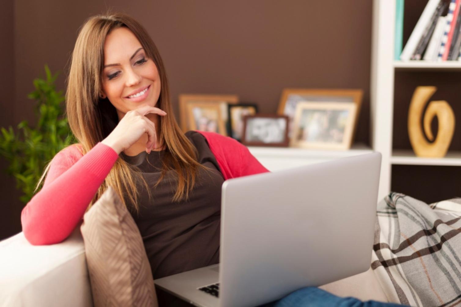 Student working on generative AI project with laptop and notebook